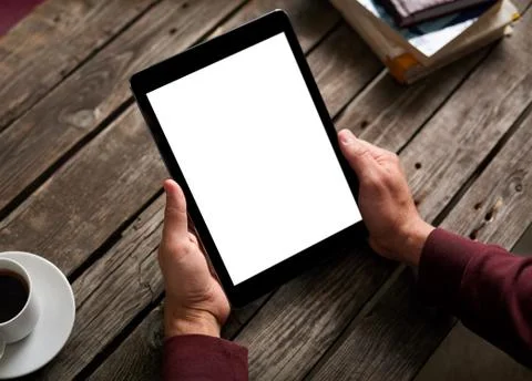 Man shows screen of digital tablet 스톡 사진