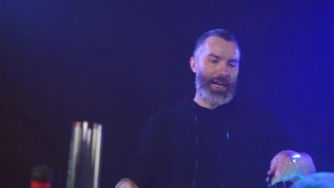 Man shows a soap bubble show in the Studio Stock Footage 141744764