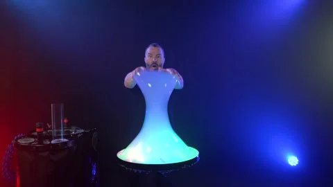 Man shows a soap bubble show in the Studio Stock Footage 141744765