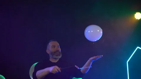 Man shows a soap bubble show in the Studio Stock Footage 141745171
