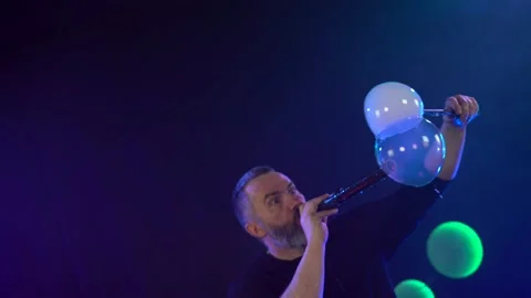 Man shows a soap bubble show in the Studio Stock Footage 141745194
