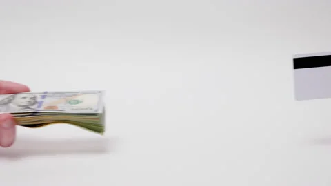 Man shows stack of dollar bills, and woman shows plastic credit card. Stock Footage 220325172