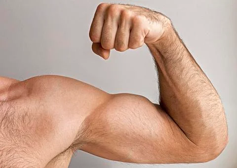 A man shows the strength Stock Photos