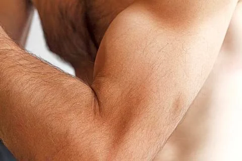 A man shows the strength Stock Photos
