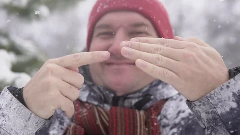 The man shows the trick with the disappearance of the ring from his finger Stock Footage 126376217