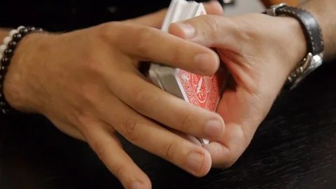 Man shows tricks on maps 스톡 동영상 119907312