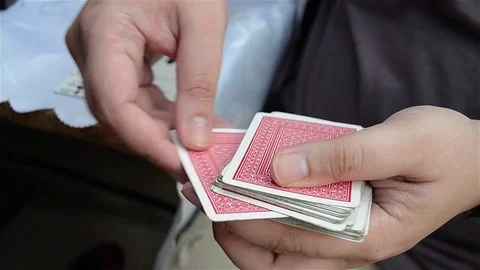 Man shuffle the cards before a game. Stock Footage 69833098