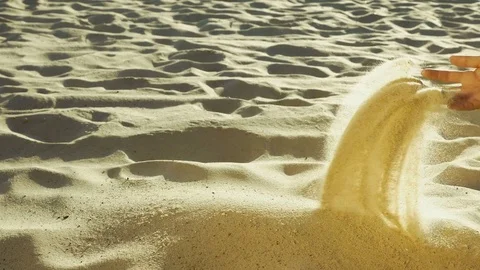 Man sieving sand with hand Stock Footage 71840564