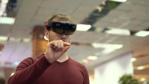 A man signals VR, a self-contained holographic computer Stock Footage 73632209