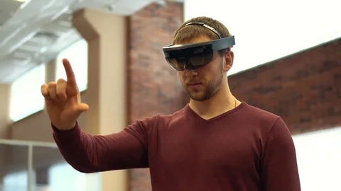 A man signals VR, a self-contained holographic computer Stock Footage 73632235