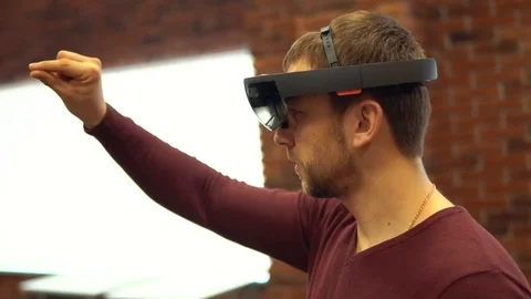 A man signals VR, a self-contained holographic computer Stock Footage 73632266