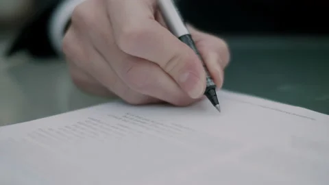 Man signing a contract Stock Footage 131030464