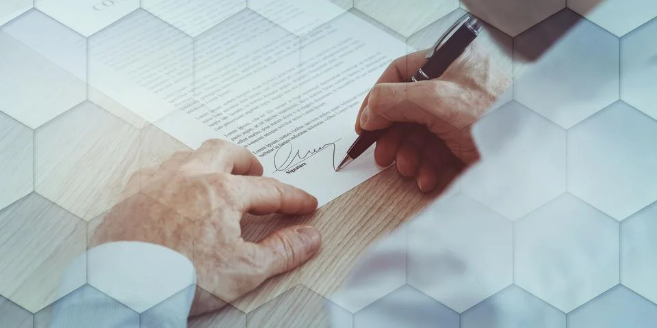 Man signing a contract, geometric pattern Stock Photos