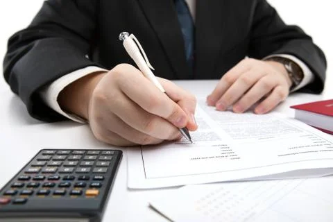 Man signing a contract Stock Photos