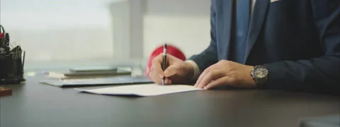 Man Signs A Contract Video stock 150560268
