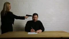 [Image: man-signs-contract-gun-point-footage-047...iconm.jpeg]