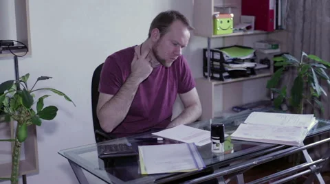 The man signs the document and puts a stamp Stock Footage 59581006