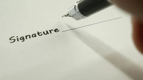 A man signs a document with an ink pen. Stock-Footage 130567465