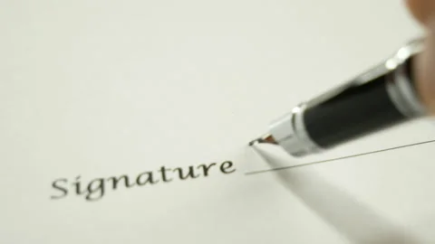 A man signs a document with an ink pen. Stock-Footage 130567476