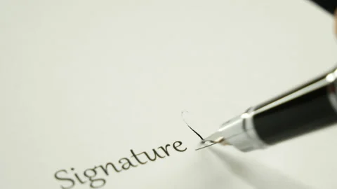 A man signs a document with an ink pen. Stock-Footage 130567489