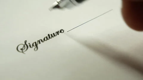 A man signs a document with an ink pen. Stock-Footage 130567513