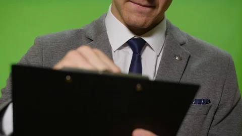 A man signs on paper and throws it away Stock Footage 113471326