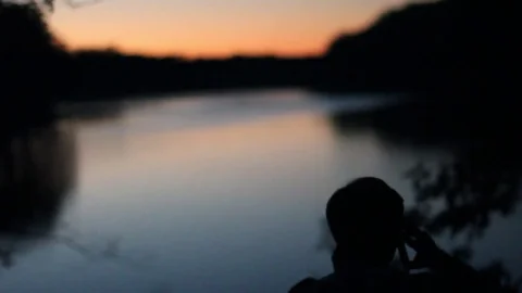 Man Silhouette Against Sunset Stock Footage 75035353