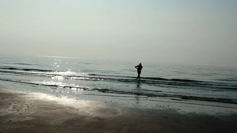 Man silhouette in the ocean Stock Footage 112127284