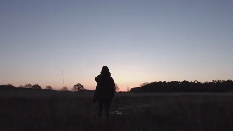 Man Silhouette Standing Sunset Stock Footage 95678826