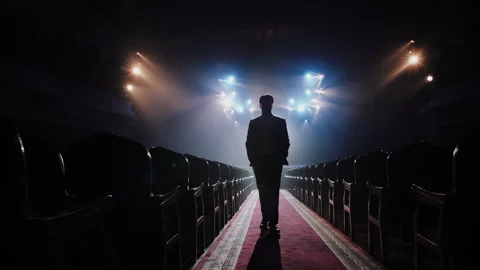 Man Silhouette Walking on Red Carpet. High Fashion Runway Concept 動画素材 336491319