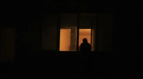 Silhouette Of Man Against Window by Stocksy Contributor