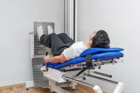 The man on the simulator at the gym Stock Photos