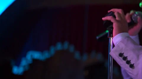 Man singing into a microphone 動画素材 55301355