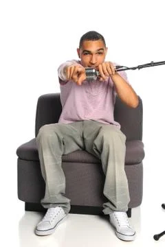 Man Singing into Microphone Stock Photos