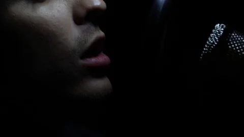 Man singing In Recording Studio with microphone Stock Footage
