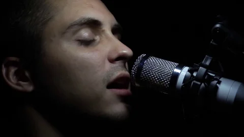 Man singing In Recording Studio with microphone Stock Footage 80680720