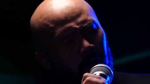 Man singing  on stage Stock Footage 130964361