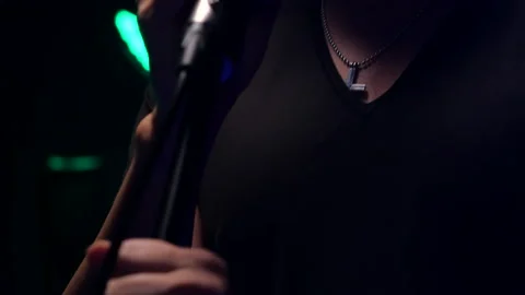 Man singing  on stage Stock Footage 130964383
