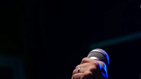 Man singing  on stage Stock Footage 130964405