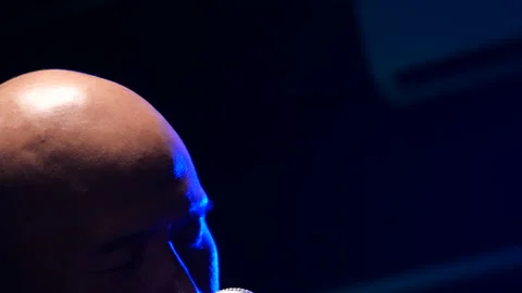 Man singing  on stage Stock Footage 130964948