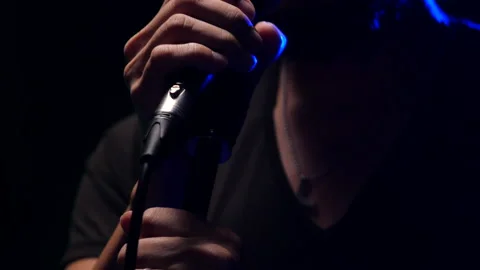 Man singing  on stage Stock Footage 130965121