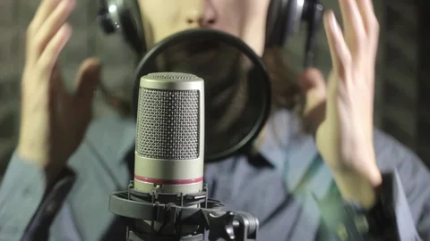 Man singing in the Studio Stock Footage 70009322