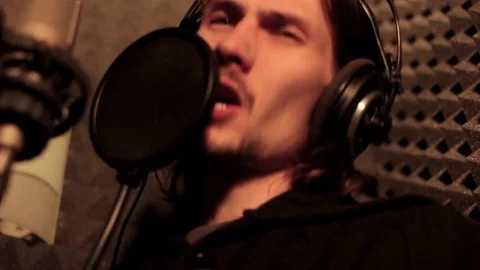 Man singing in the Studio Stock Footage 70780840
