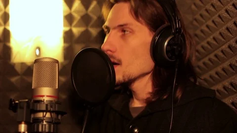 Man singing in the Studio Video stock 70891925