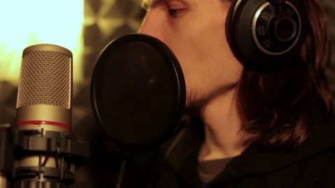 Man singing in the Studio Stock Footage 70892039