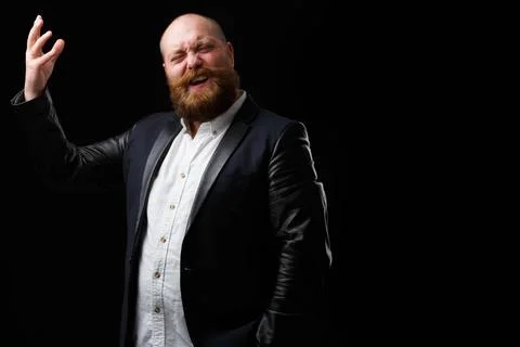 Man sings on empty background Man with ginger beard and mustache in black ... Foto stock