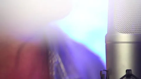 A man sings in a microphone Stock-Footage 65226419