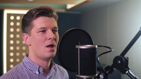 Man sings in recording studio. Face close up Stock Footage 104646651