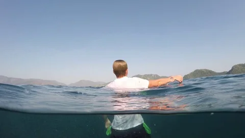 Man sinking into the sea Stock Footage 77665926