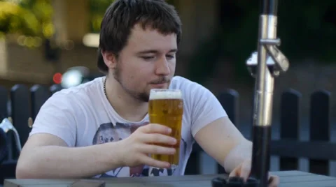 Man Sips Beer In Pub Stock Footage 39679193